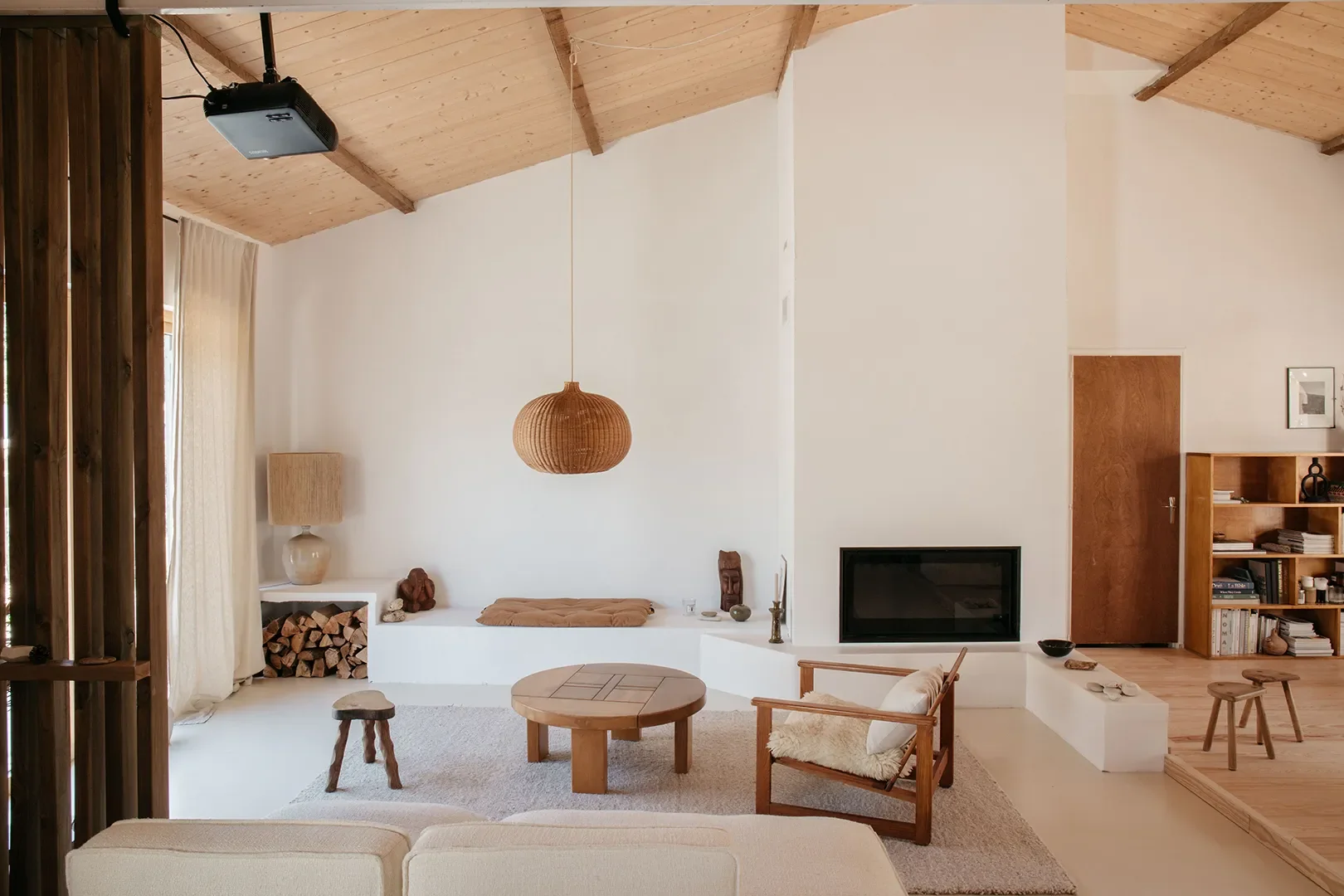 A Plaster Staircase Masquerades as Kitchen Storage in This Serene Seaside French Home