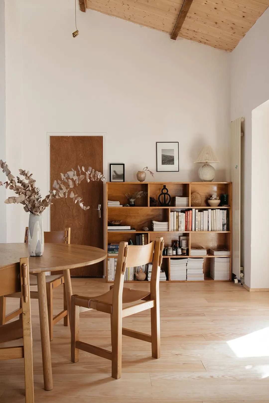 A Plaster Staircase Masquerades as Kitchen Storage in This Serene Seaside French Home