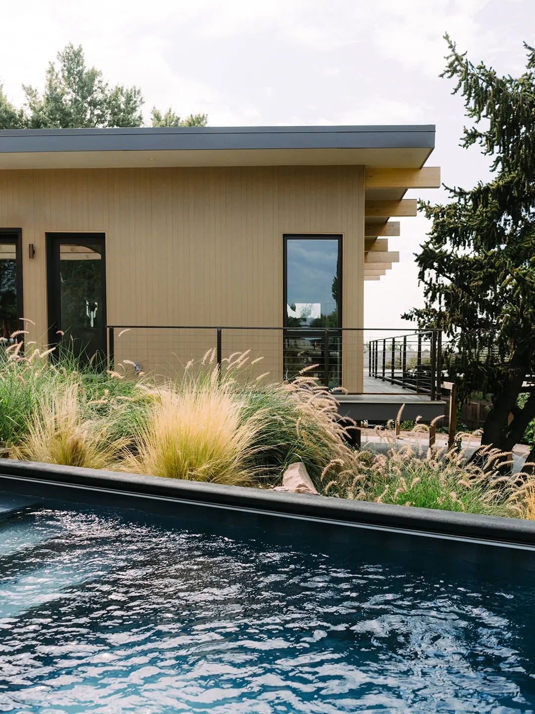 Local Pink Flagstone and Foraged Leaves Inspired This Hillside Denver Home's Soothing Palette