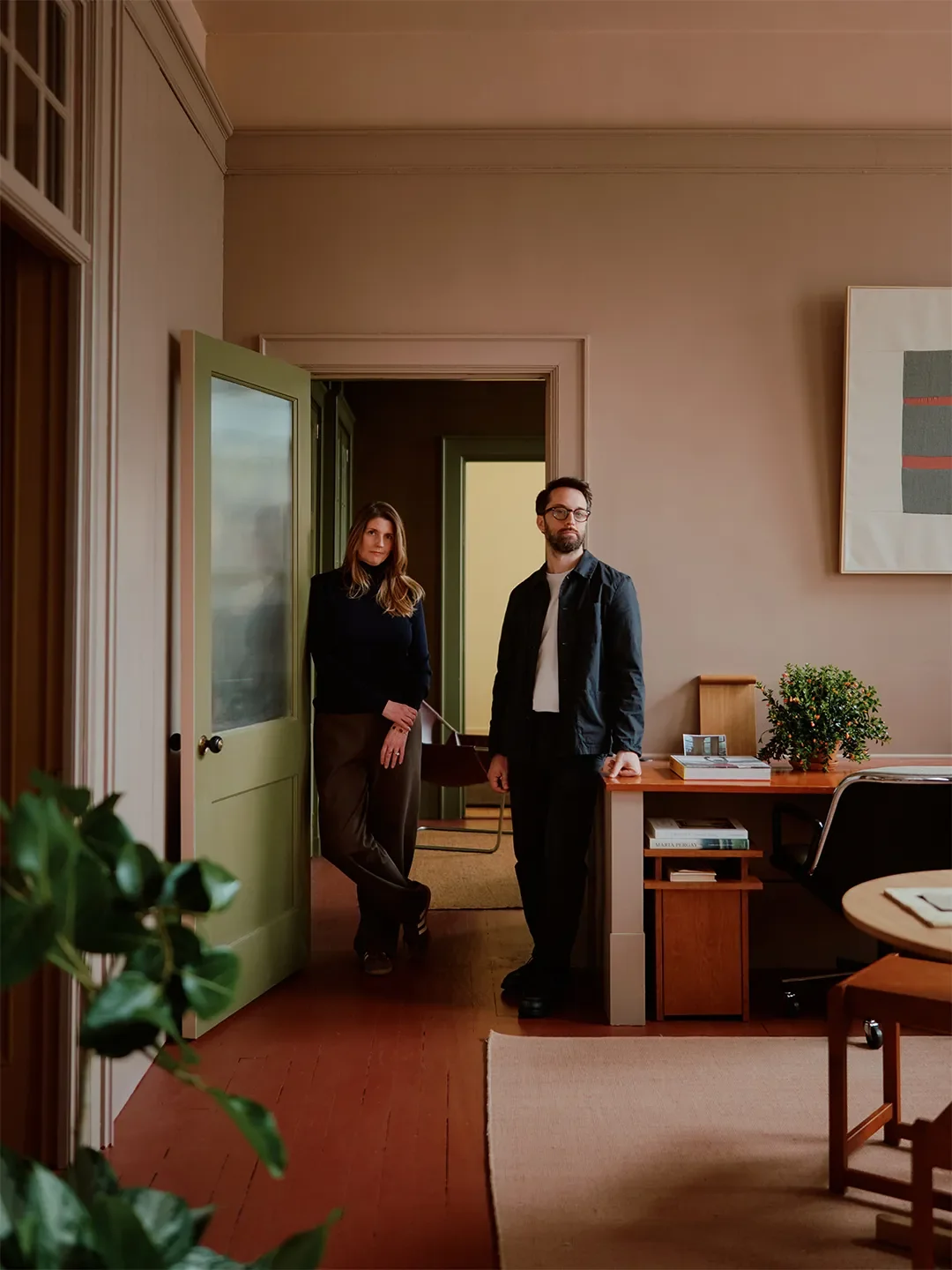 Mismatched Doorknobs and Crimson Floors Give This Design Studio Its Collected Character