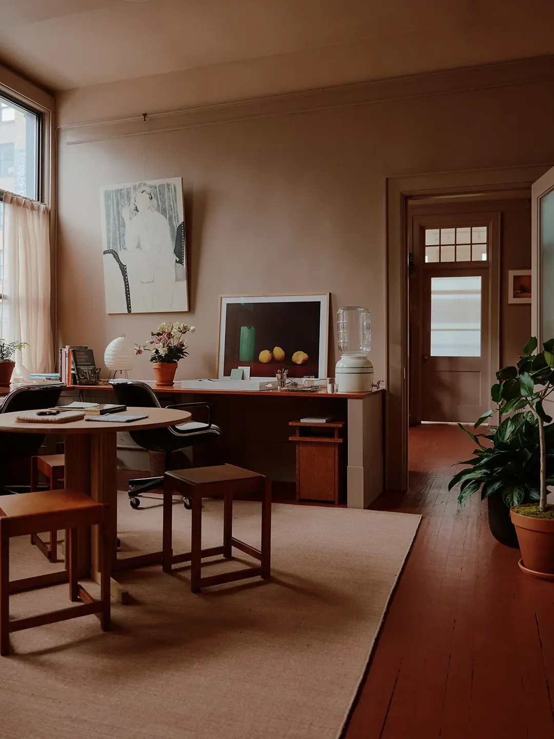 Mismatched Doorknobs and Crimson Floors Give This Design Studio Its Collected Character