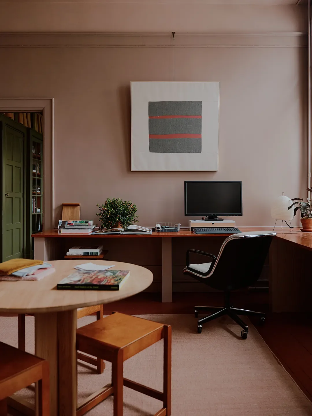 Mismatched Doorknobs and Crimson Floors Give This Design Studio Its Collected Character