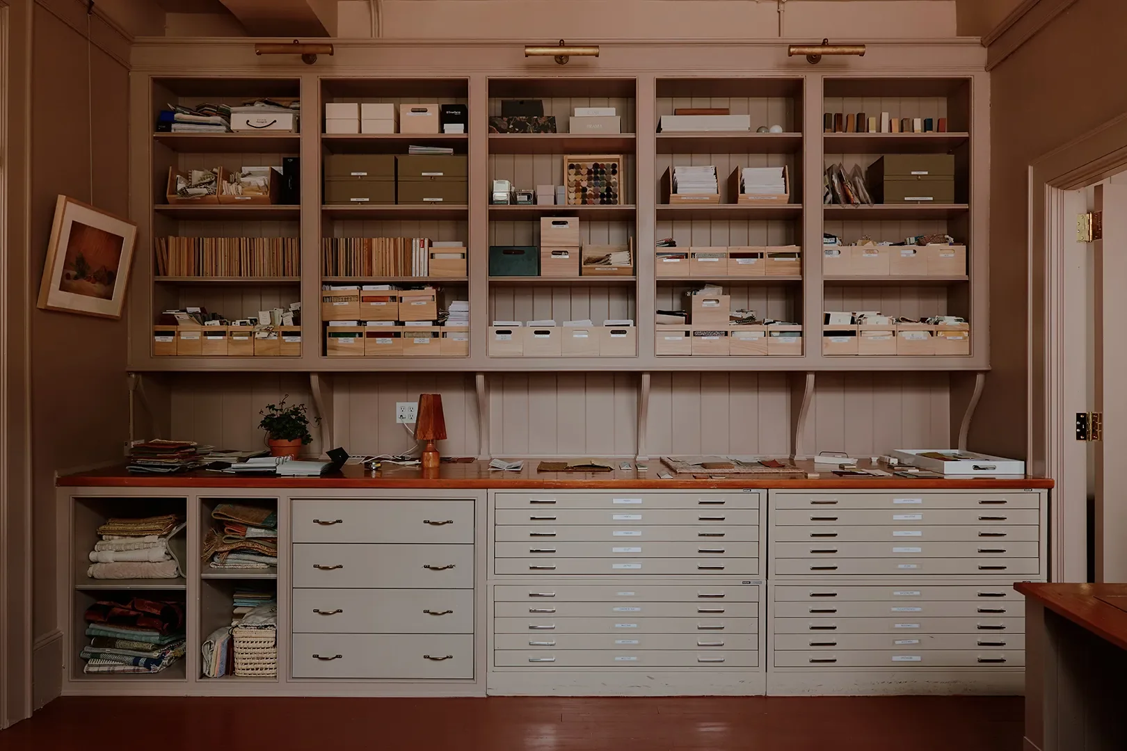Mismatched Doorknobs and Crimson Floors Give This Design Studio Its Collected Character