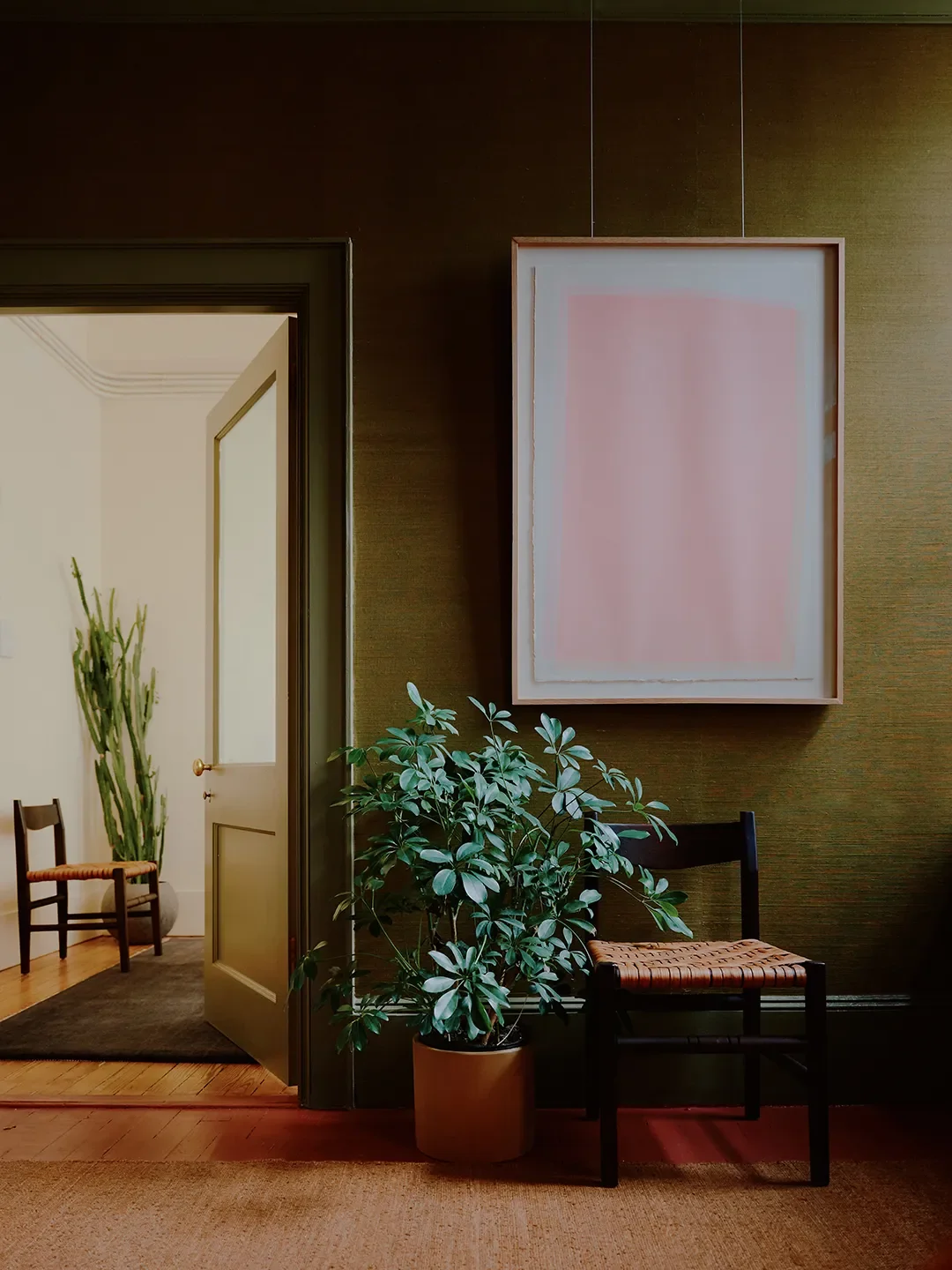 Mismatched Doorknobs and Crimson Floors Give This Design Studio Its Collected Character