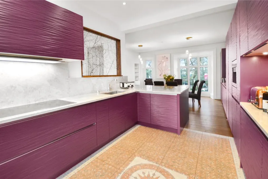 The Magenta Cabinets Stayed, But This Kitchen Looks Brand-New After a Artsy Remodel